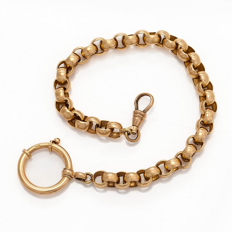 Kellovitja, 18K kultaa.