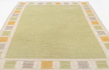 A flat weave carpet, c 343 x 235 cm, signed BS.