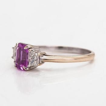 An 18K white gold ring with a pink sapphire and diamonds, totaling approx 0.34 ct.