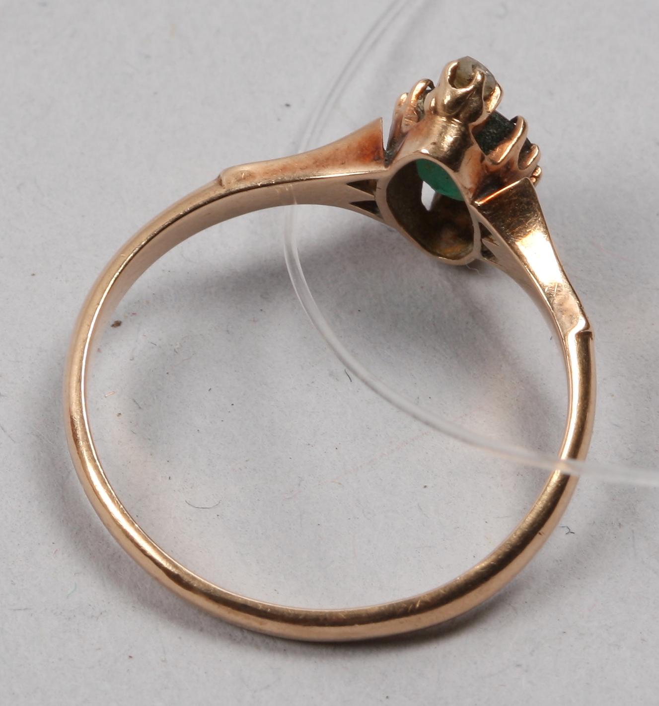 RING, rött guld med turmalin och två små diamanter.