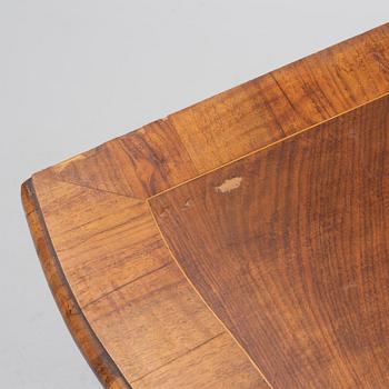 A Rococo-style chest of drawers, 19th century.