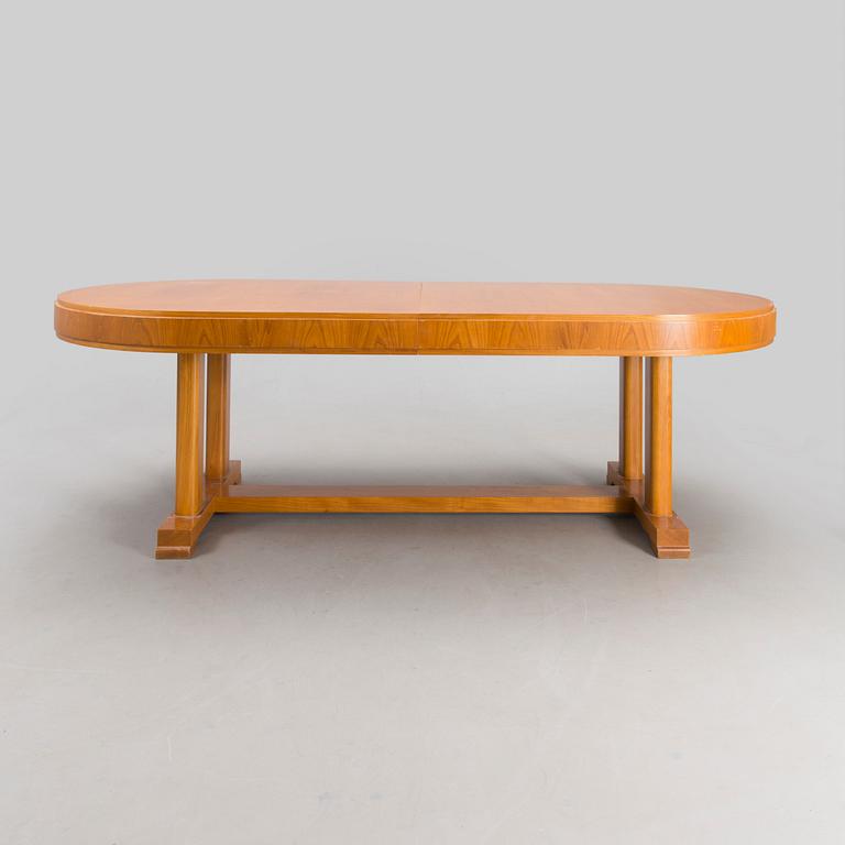 A mid 20th century dining table.