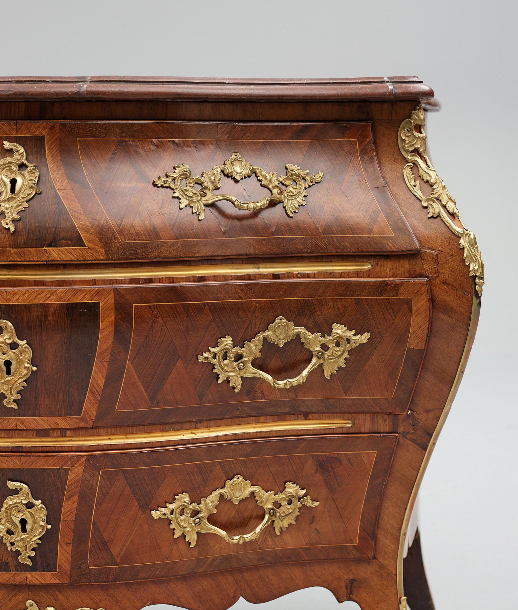 A Swedish Rococo commode by G Foltiern (master in Stockholm 1771-1804).