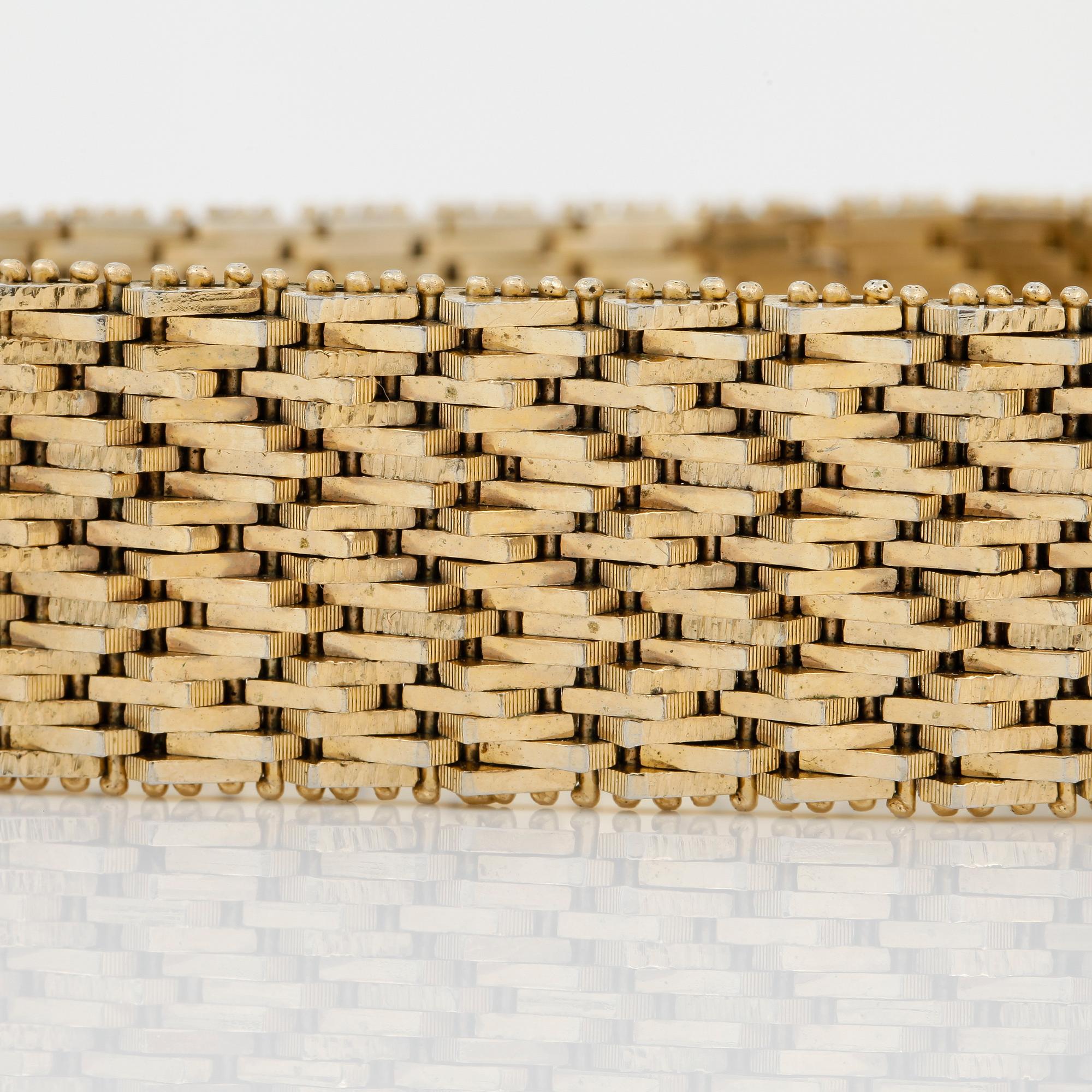 ARMBAND, guld 18K, 1900-talets andra hälft. Vikt ca 63 gram.