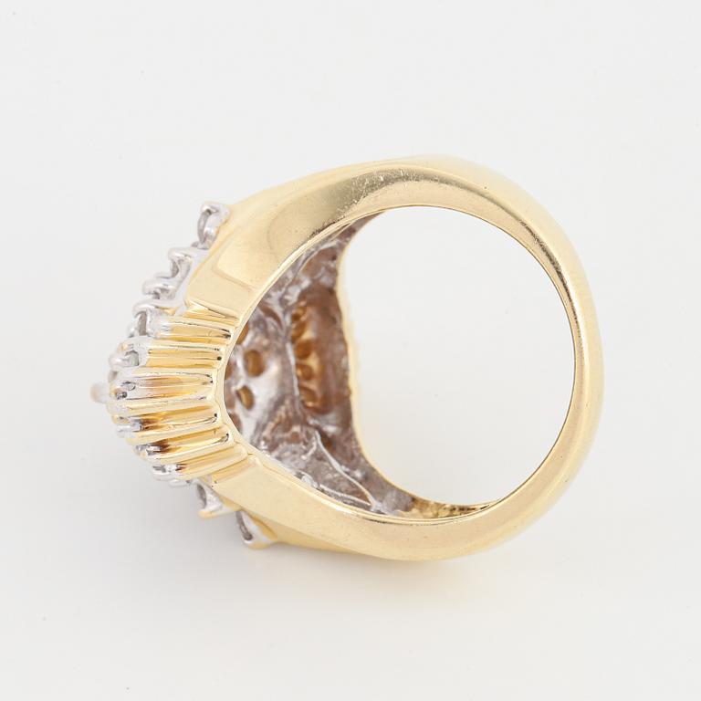 14K gold and diamond ring.