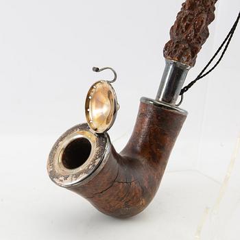 Long pipe  Carved wood with a silver mount Hasa Malmö 1986.