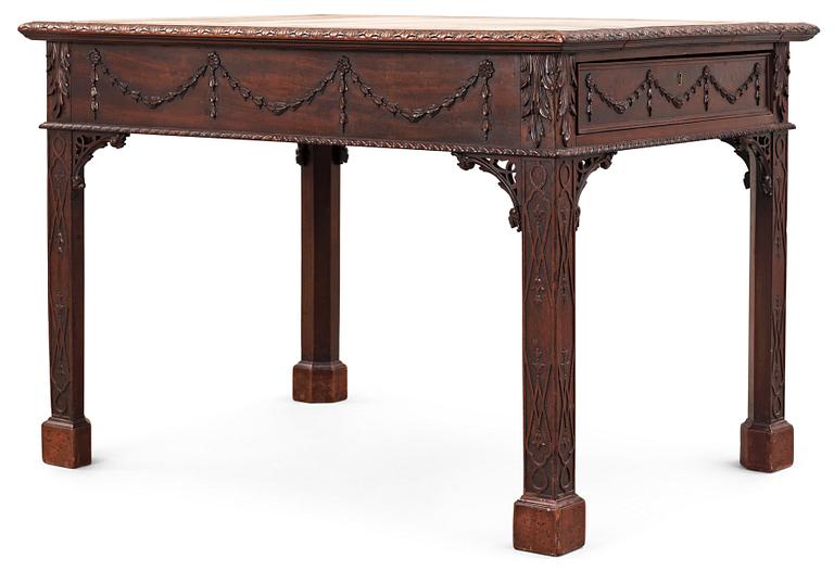 An English 18th century mahogany library table in the manner of Thomas Chippendale.