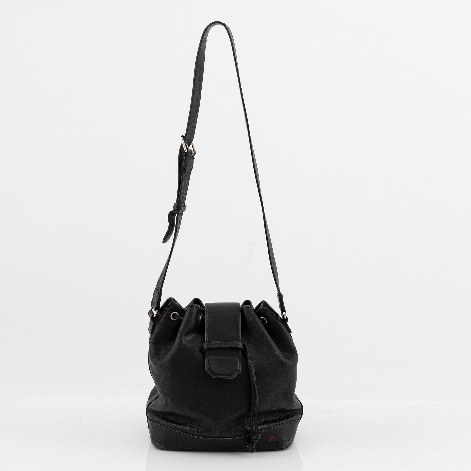 Kenzo, a black leather bucket bag.