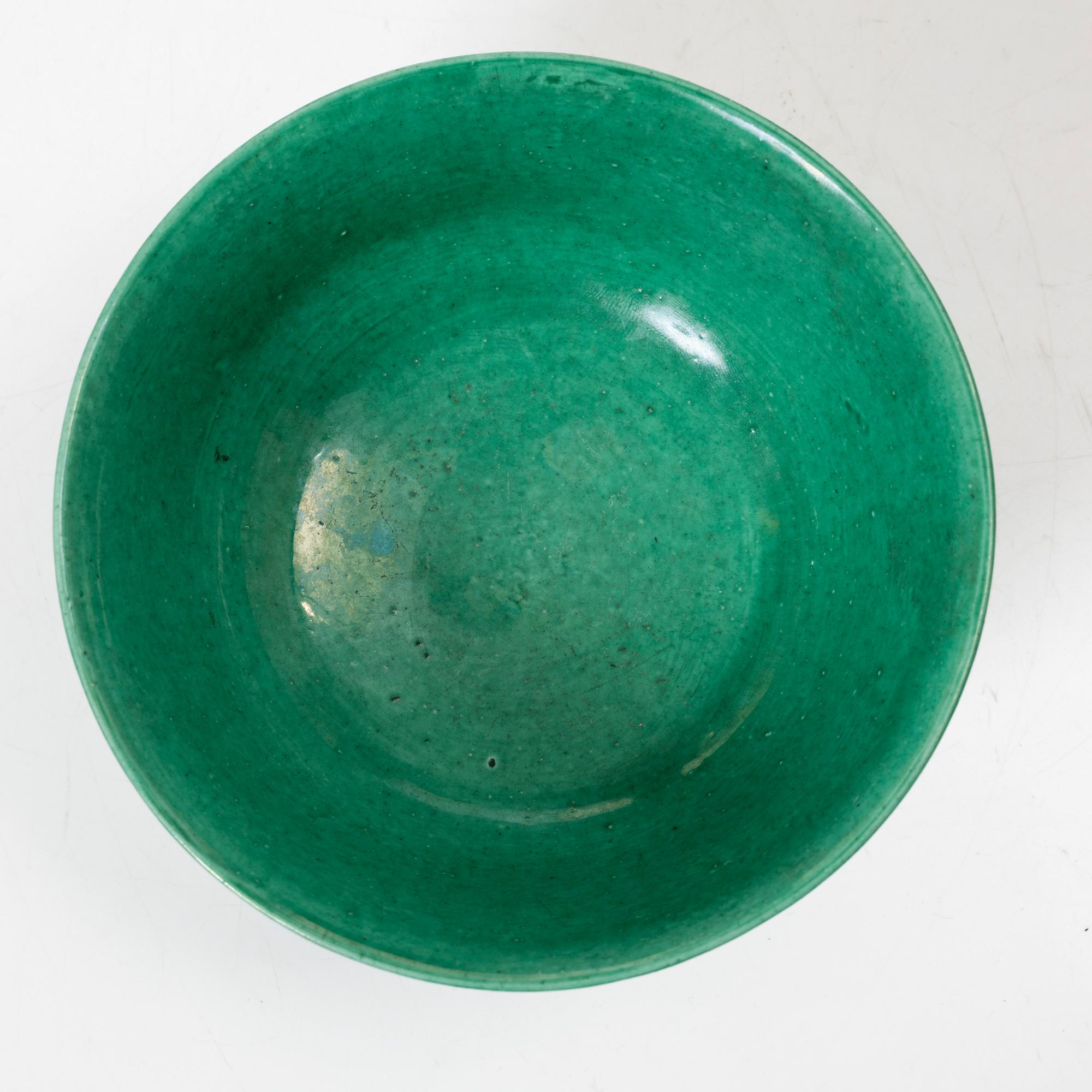 A Chinese green glazed 'three friends of winter' bowl, Republic, 20th century.