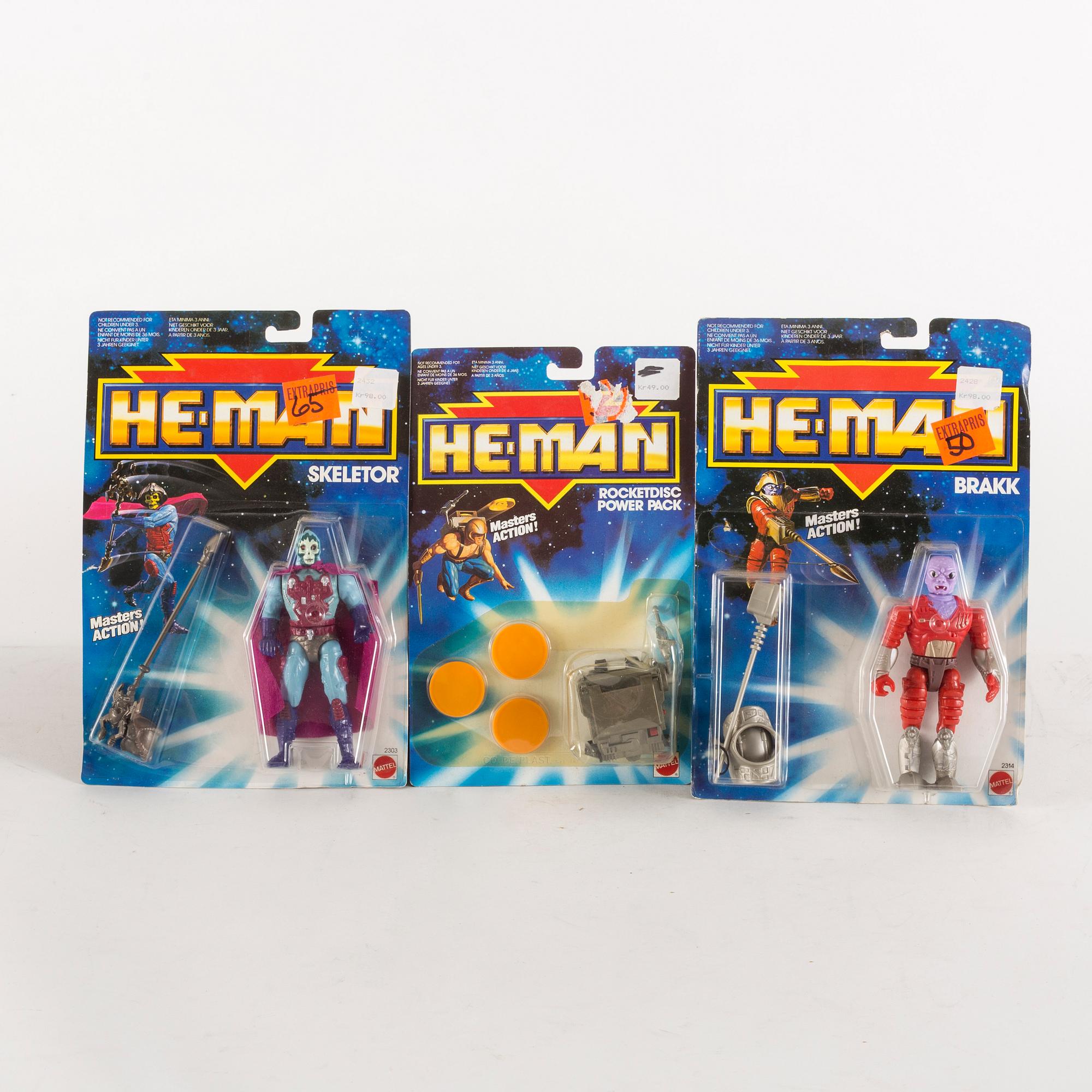 HE-MAN, 12 stycken actionfigurer i förpackning, Mattel, 1988.