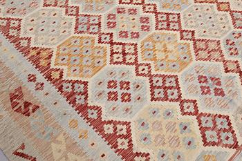 A Kilim carpet, c 391 x 317 cm.