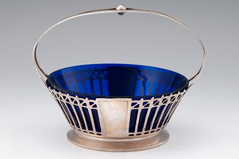 A SILVER AND GLASS BASKET.