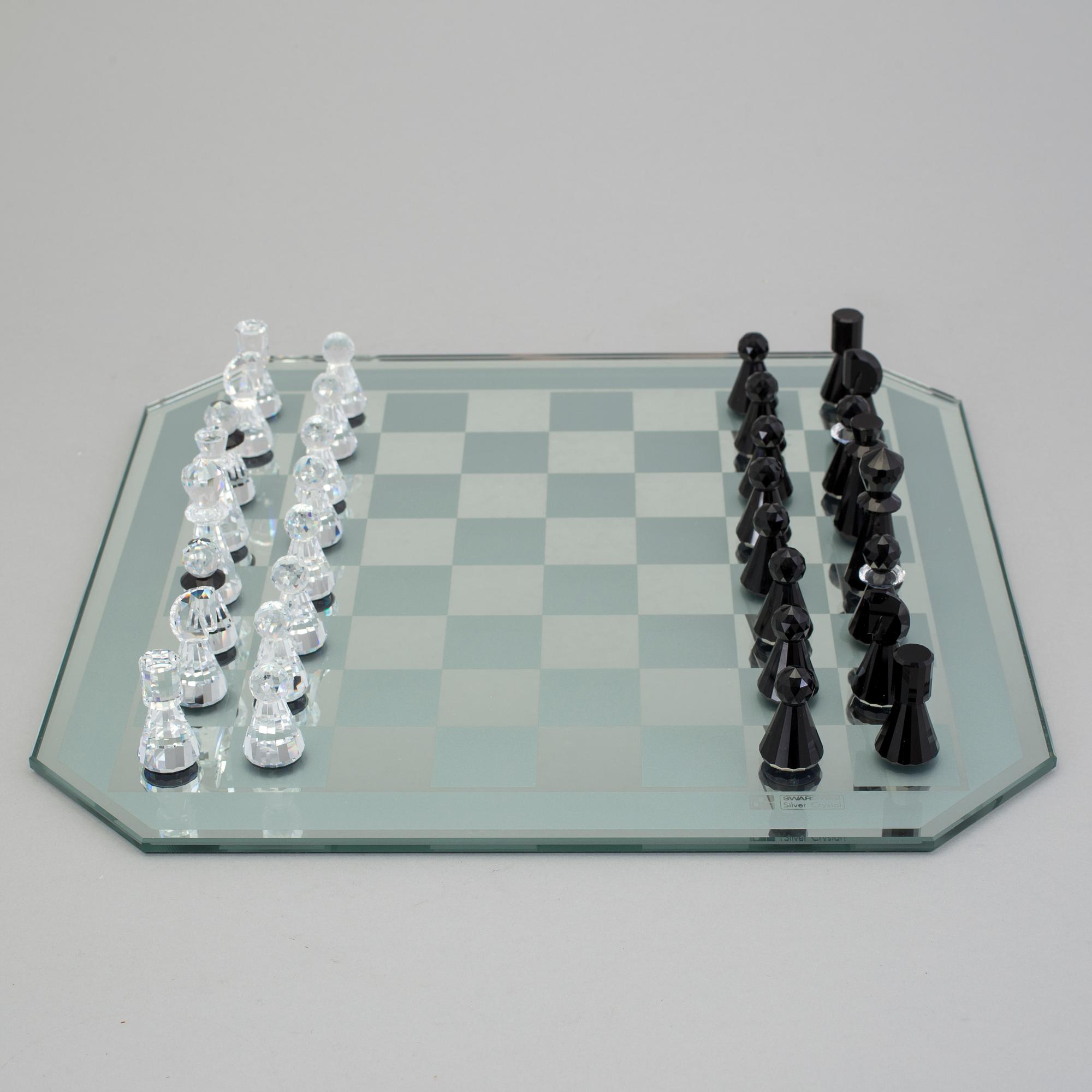 A SWAROVSKI CHESS SET.