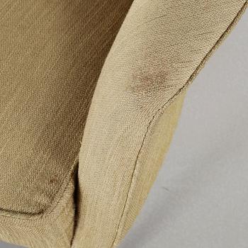 A 'Lilla Adam' easy chair by Nordiska Kompaniet.