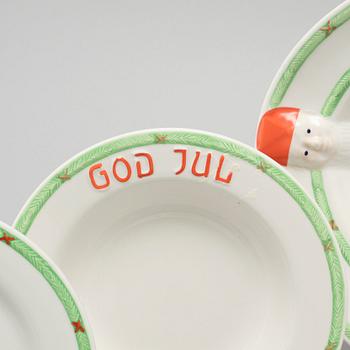 A 20th century set of earthenware tableware of 21 pcs by Gustavsberg.