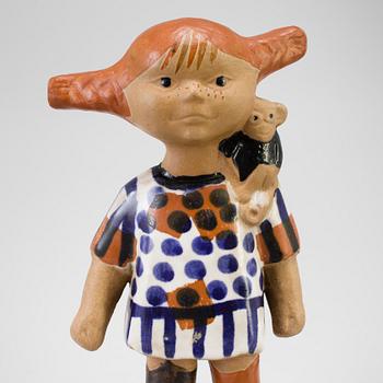 A stoneware figurine by Lisa Larson for Gustavsberg, Pippi Långstrump, produced 1969-1971.