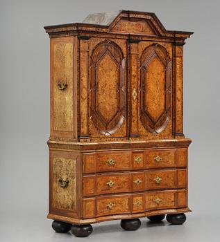 A Swedish late baroque burr-alder cabinet, first part 18th century.