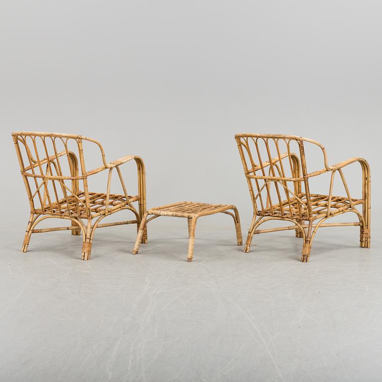 A pair of Garden Armchairs with one stool, mid 20th century.