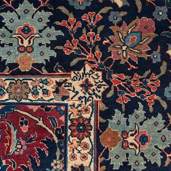 A carpet, semi-antique Tabriz, ca 413,5 x 328,5 cm.