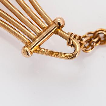 A 14K gold necklace, with an amethyst. Auran Kultaseppä, Turku.
