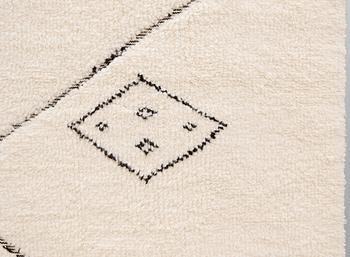 A moroccan carpet, ca 300 x 200 cm.