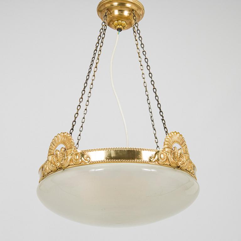 Kattovalaisin, 1900-luvun alku.