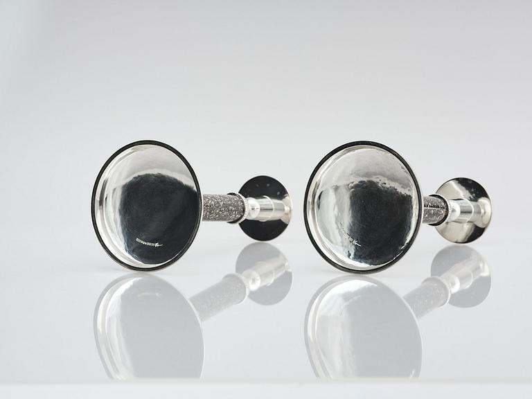 Henrik Ingemansson, a pair of sterling silver and Älvdal porphyry candelsticks, Ingemansson's Smithy, Stockholm, 2002.