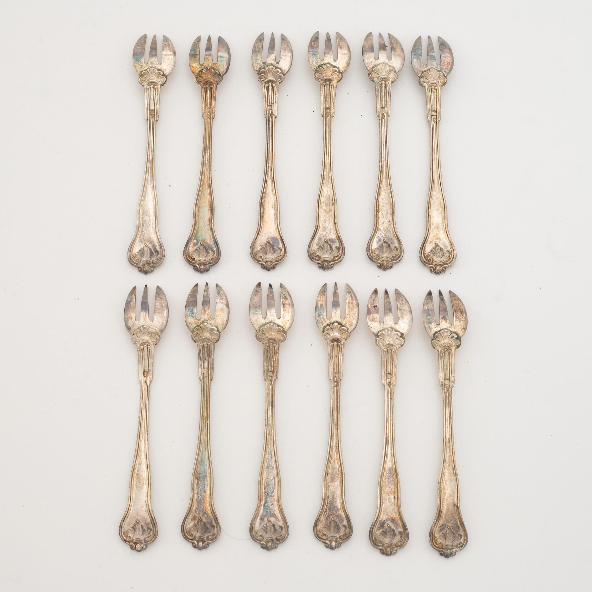 Ostrongafflar, 12 st, silver, Hippolyte Thomas, Paris, Frankrike (1845-55).