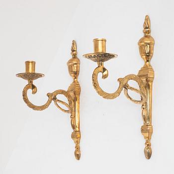 A pair of 'Törne' brass one-light wall ligths from IKEA's 18th Century collection.