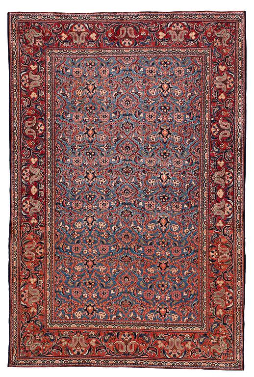 A rug, semi-antique Kashan, ca 197,5 x 132 cm.