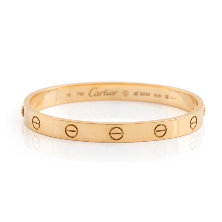 A Cartier "Love" bracelet in 18K gold.