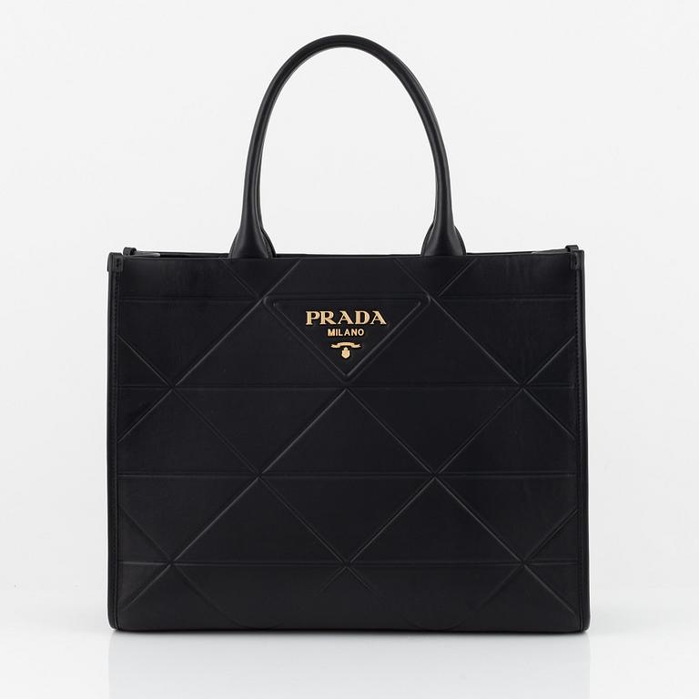 Prada, a black leather bag.