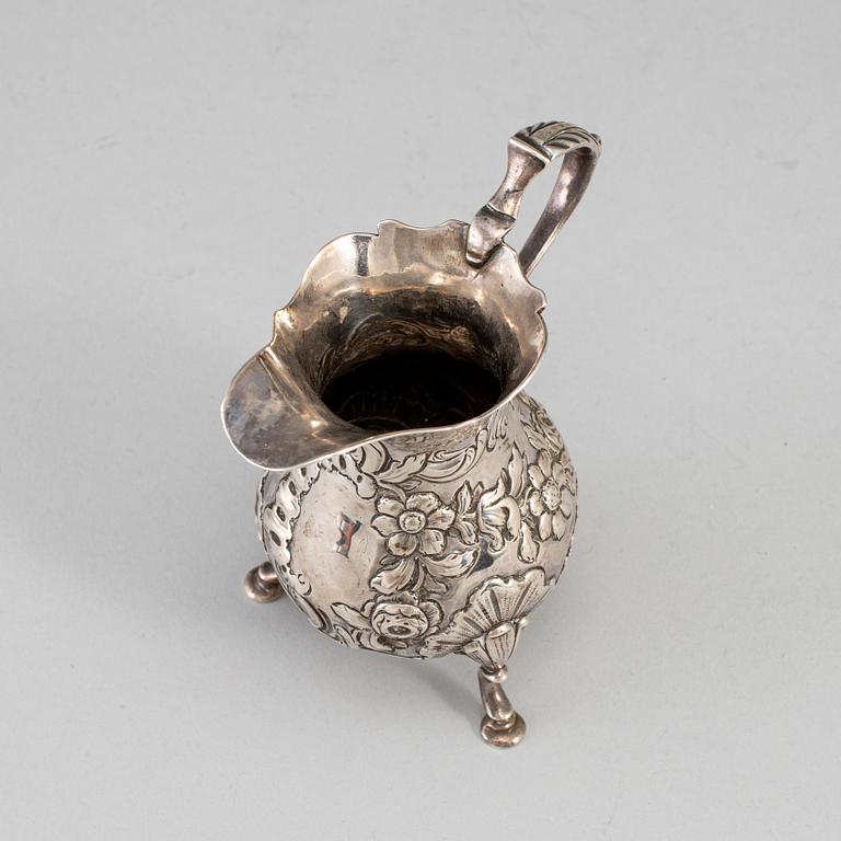 An English mid 18th century silver cream-jug, mark of David Hennell I, London 1754.