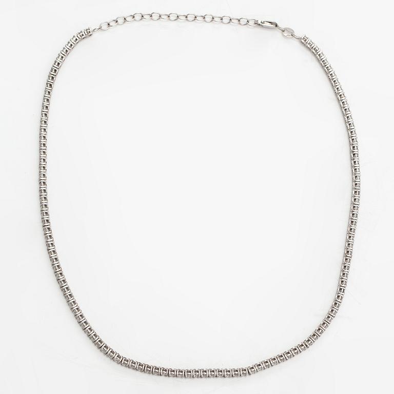 A tennis necklace/bracelet, 14K white gold and diamonds ca. 6.96 ct in total. AIG certifiacete.