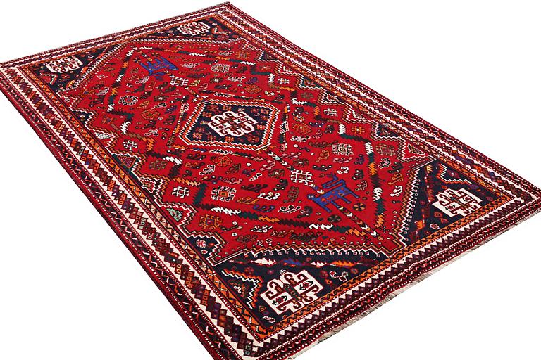 A Qashqai carpet, c. 252 x 162 cm.