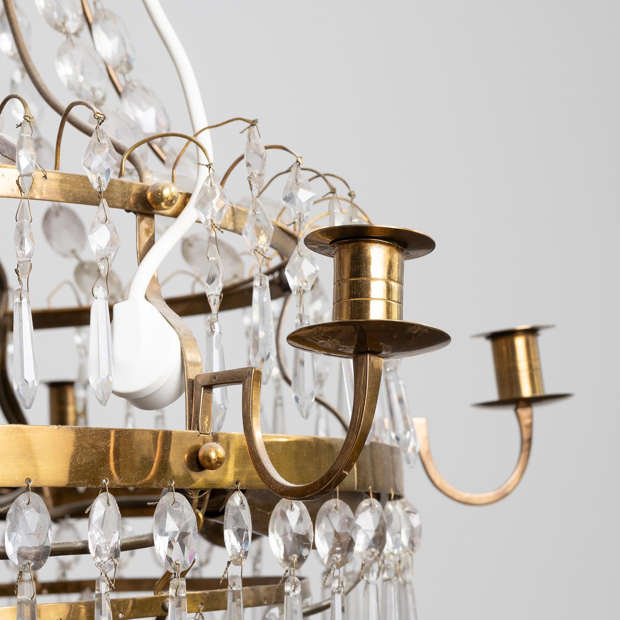 A chandelier, early 20th Century with older parts. Late Gustavian style.