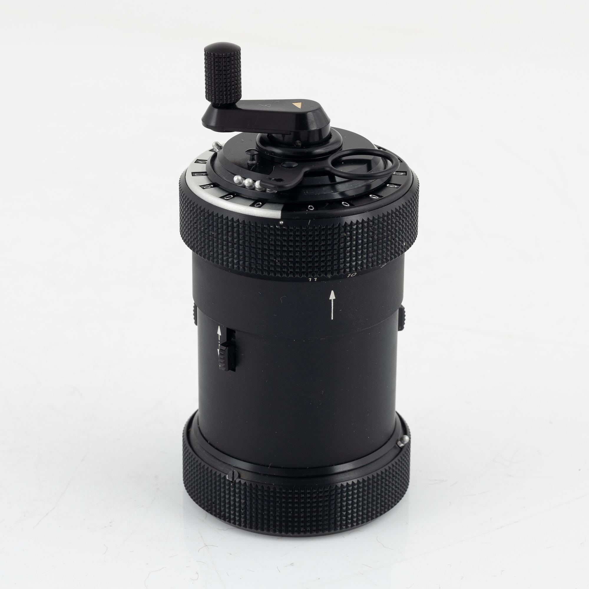 A Curta Type I mechanical calculator.