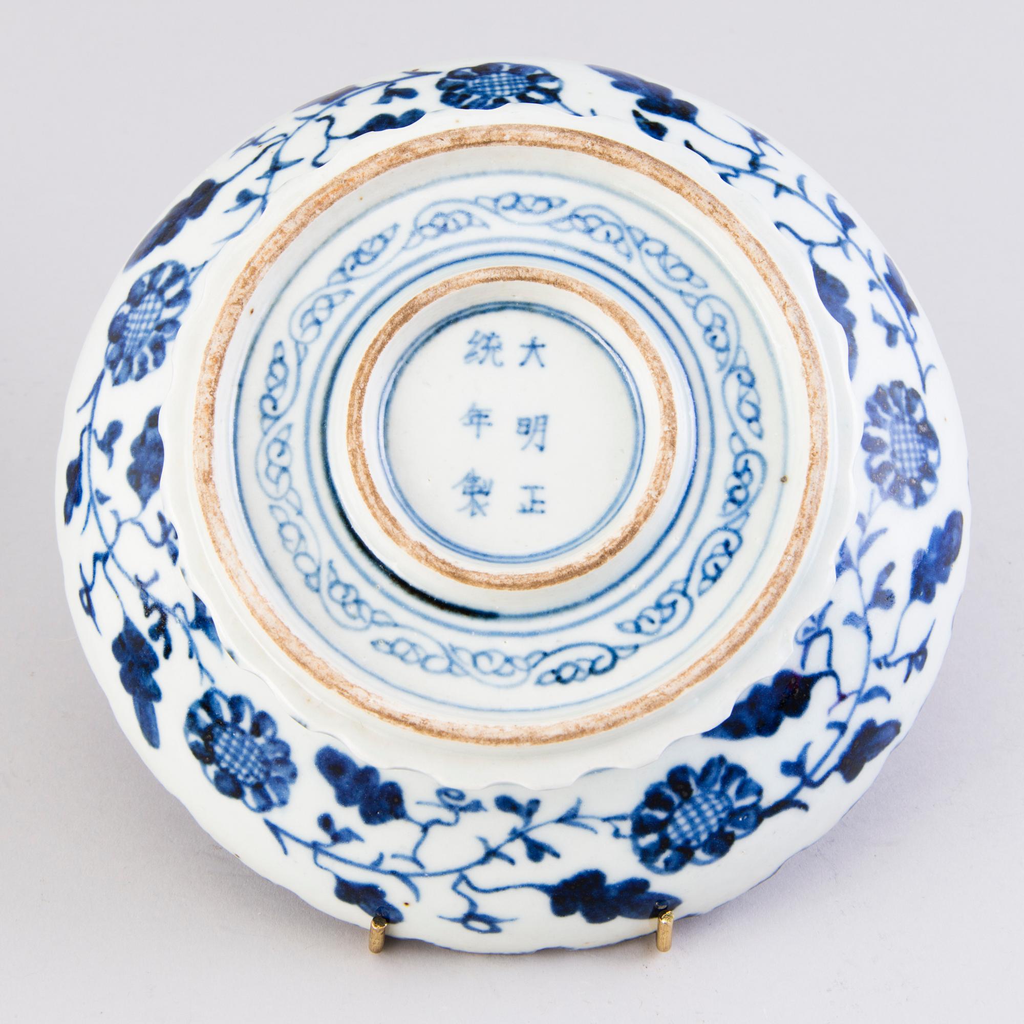Four pieces of Chinese porcelain, two of which dated to the Ming dynasty (1364-1644).