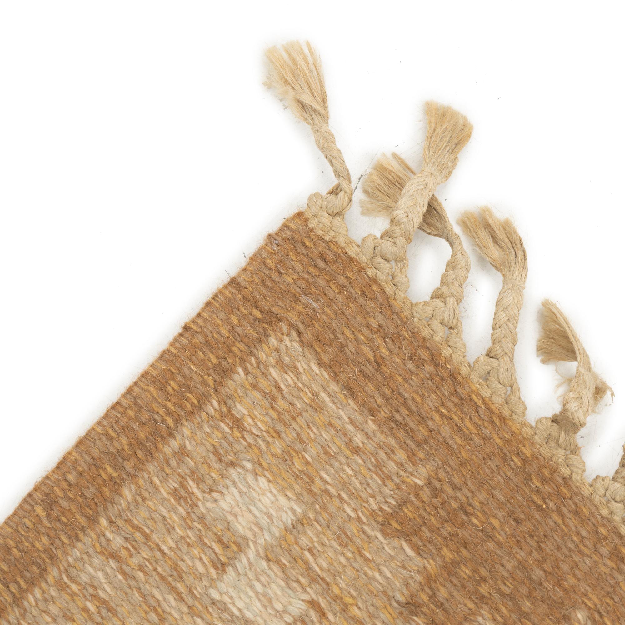 A flat weave rug, signed GG, Gitt Grännsjö-Carlsson, c. 205 x 138 cm.
