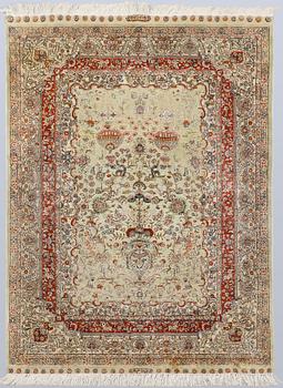 An Oriental silk rug, approx. 126 x 91 cm.