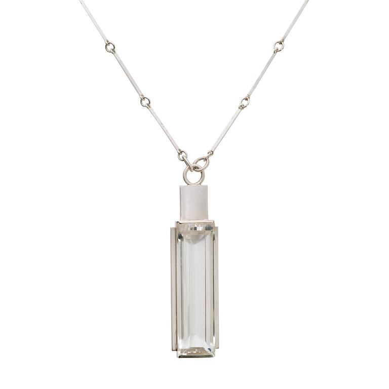 A Wiwen Nilsson sterling facet cut rock crystal pendant and chain, Lund 1933.