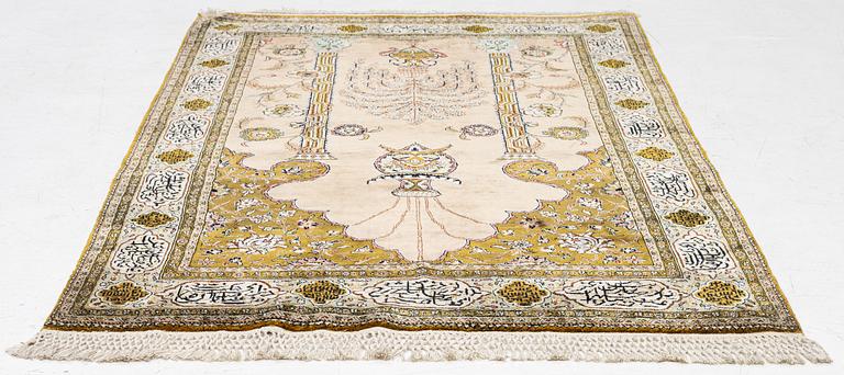 A silk Quum rug, c. 155 x 103 cm.