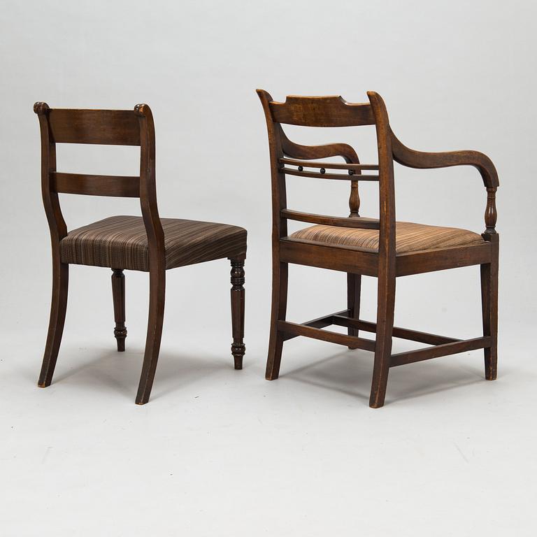Matbord och 8 stolar, mahogny, tageltyg, England, 1900-talets första hälft.