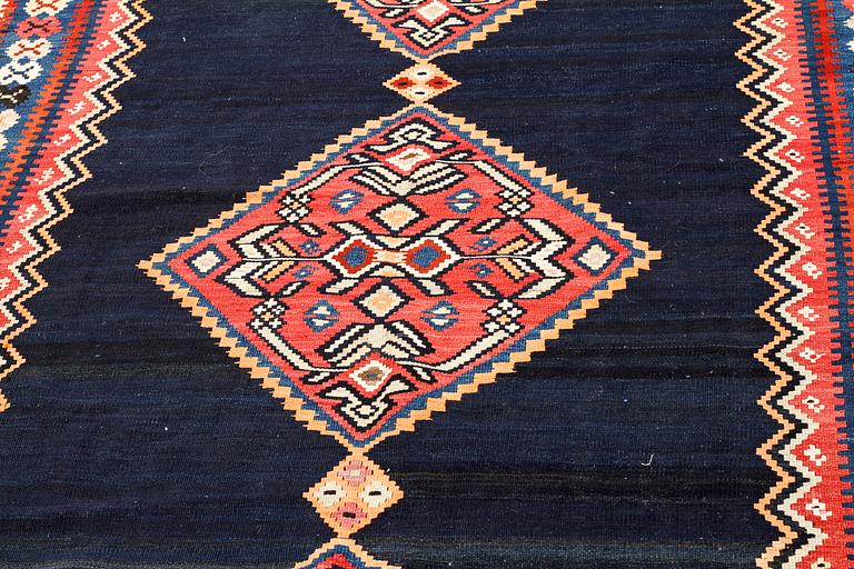 A kelim rug, 342 x 150 cm.