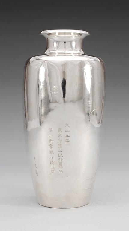A Japanese silver vase, signed, early 20th Century.