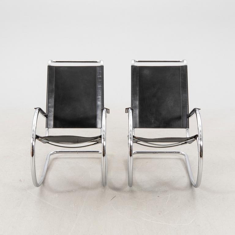 A pair of Fasem leather and chrome rocking chairs Italy later part of the 20th century.