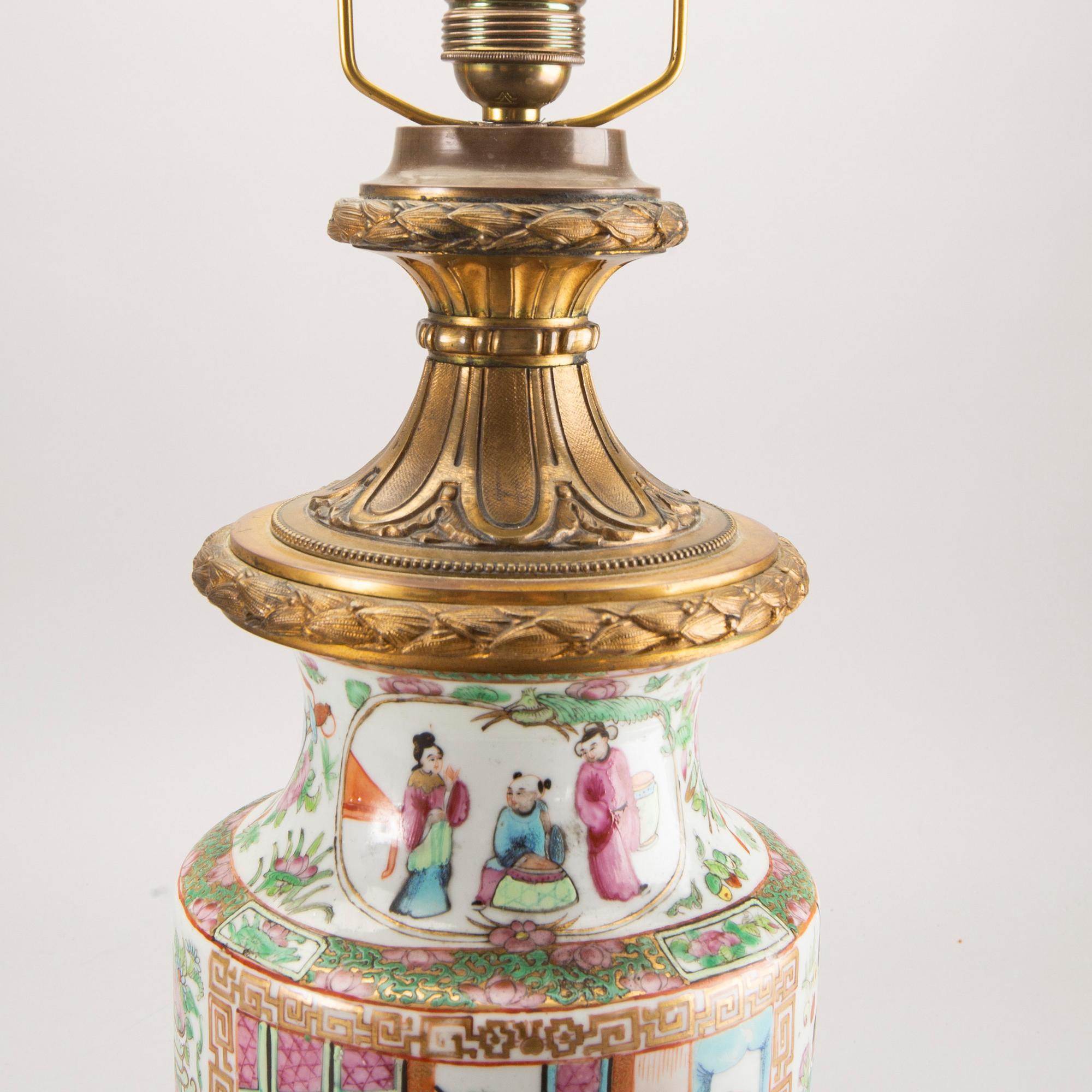 A Chinese porcelain and metal table lamp around 1900.