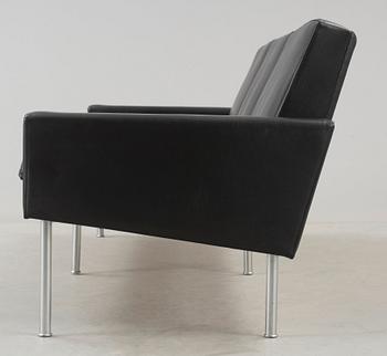 A Hans J Wegner three-seated black leather 'GE-34' sofa, AP-stolen, Denmark 1950's-60's.