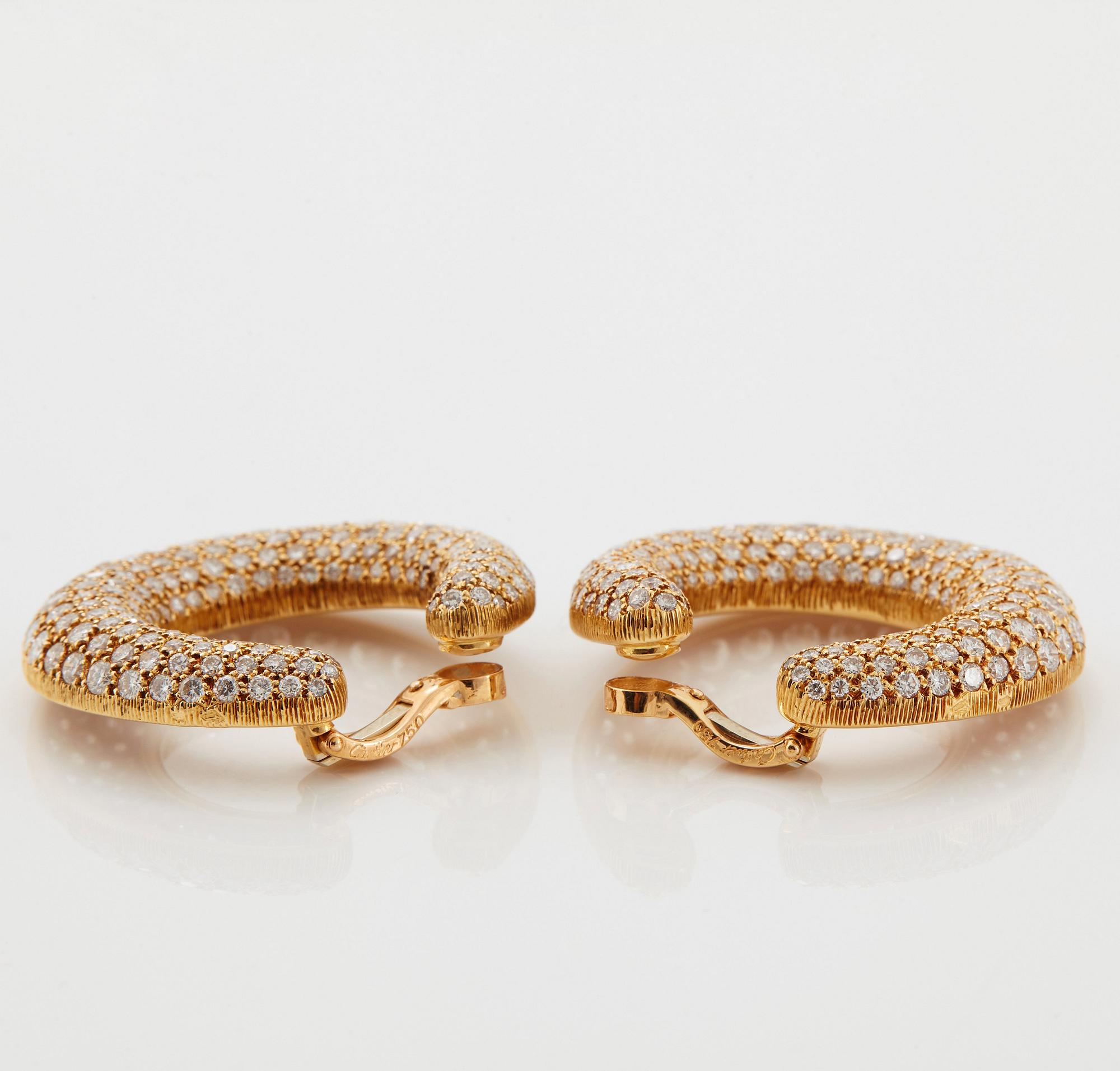 Cartier ett par örhängen.