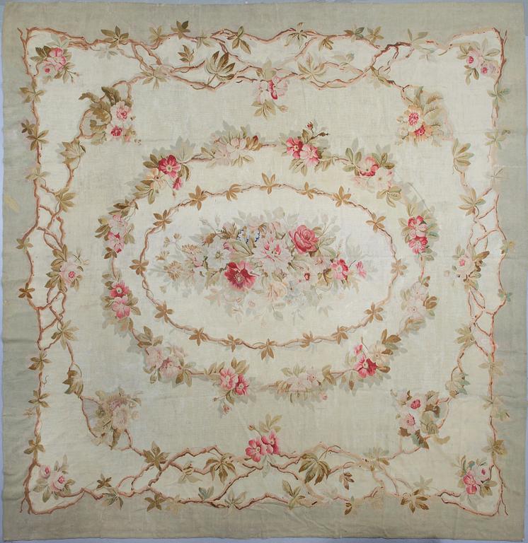 A carpet, tapestry weave, ca 385-387,5 x 391,5-404,5 cm, Aubusson, France the 19th century.